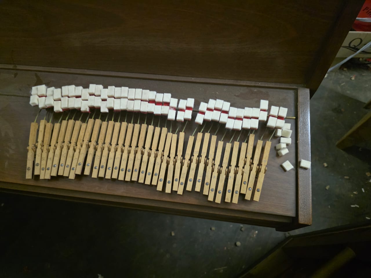 Piano action parts prepared with new tapes and felt