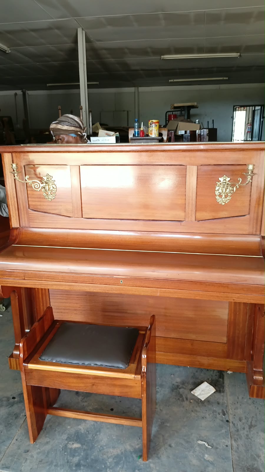 Closed fallboard showing the restored cabinet woodwork